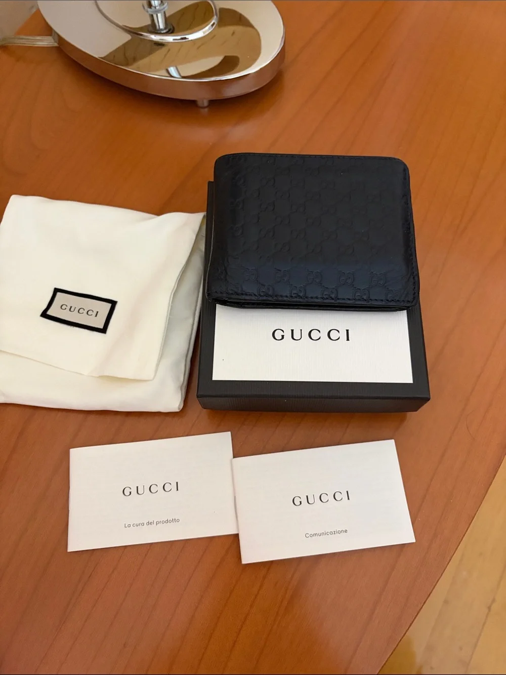 Gucci DARK BLUE Embossed Leather Bi-Fold Wallet with Logo Pattern